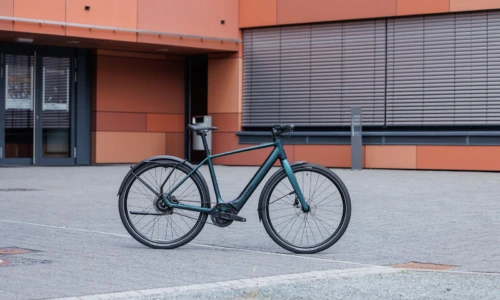 Bicicleta eléctrica Cube Editor Hybrid SLX 400X FE glitterteal´n´black Barra alta – vista en exterior | Ebike.es