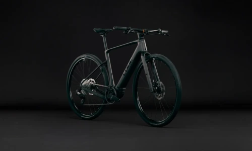 Bicicleta eléctrica Cube Nulane Hybrid C:62 SLX 400X mineralblack´n´orange – vista frontal | Ebike.es